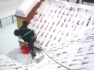 Usuwanie śniegu z dachów